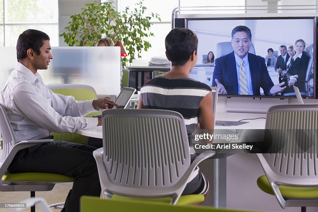 Business people working in teleconference