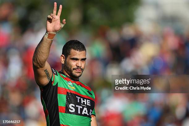 Greg Inglis of the Rabbitohs celebrates after winning the round 14 NRL match between the South Sydney Rabbitohs and the Gold Coast Titans at Barlow...