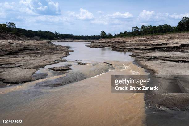 Aerial view of a drought-hit Furo do Paracuuba, a small branch of the Amazon River that connects with the Negro River on October 04, 2023 in Manaus,...