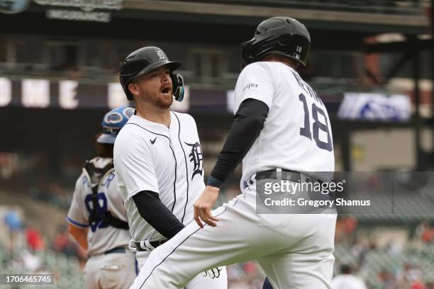 Jake Rogers of the Detroit Tigers celebrates his two run home run in the eighth inning with Tyler Nevin while playing the Kansas City Royals at...