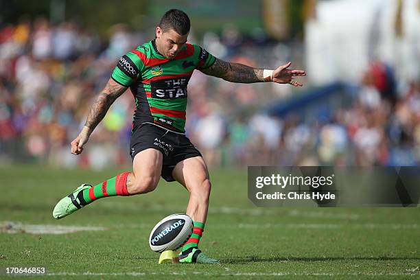 Adam Reynolds of the Rabbitohs kicks during the round 14 NRL match between the South Sydney Rabbitohs and the Gold Coast Titans at Barlow Park on...