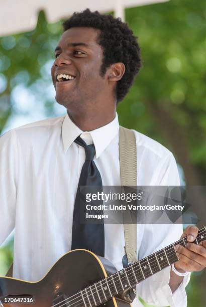 American blues musician Gary Clark Jr performs with the Honeydripper All-Stars on Grant Park's Crossroads Stage during the 24th Annual Chicago Blues...
