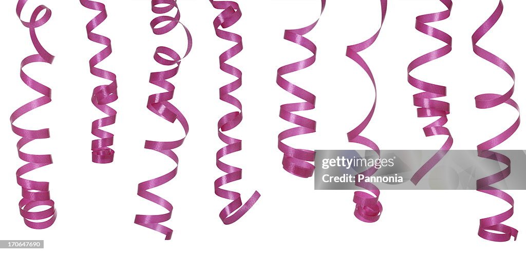 Curled pink ribbons on a white background