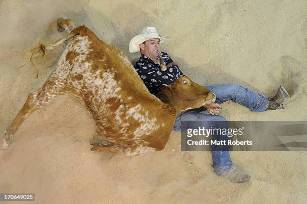 Terry Evison of Nilma competes in the Steer Wrestling during the National Rodeo Finals on June 16, 2013 on the Gold Coast, Australia.