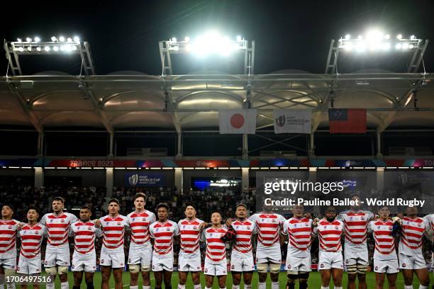 The players of Japan line up during the National Anthems prior to the Rugby World Cup France 2023 match between Japan and Samoa at Stadium de...