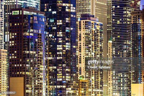 chicago skyscrapers - bright chicago city lights stock pictures, royalty-free photos & images