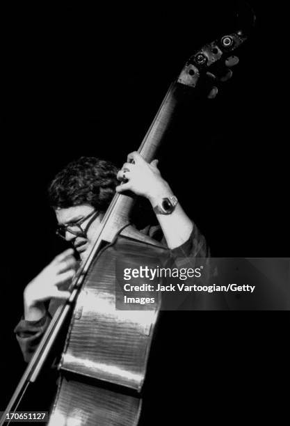 American jazz musician Charlie Haden plays upright acoustic bass with Keith Jarrett's band during the Schaefer Music Festival at Central Park's...