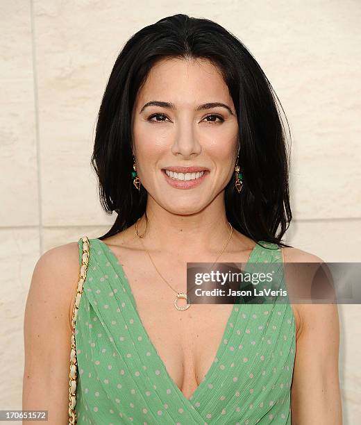 Actress Jaime Murray attends the "Dexter" series finale season premiere party at Milk Studios on June 15, 2013 in Hollywood, California.