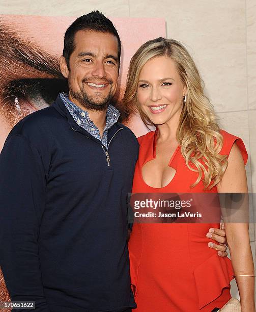 Actress Julie Benz and husband Rich Orosco attend the "Dexter" series finale season premiere party at Milk Studios on June 15, 2013 in Hollywood,...