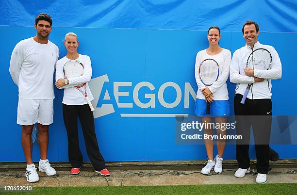 Mark Philippoussis and Rennae Stubbs of Australia pose with Lindsay Davenport of USA and Greg Rusedski of Great Britain on Legends' Day during day...