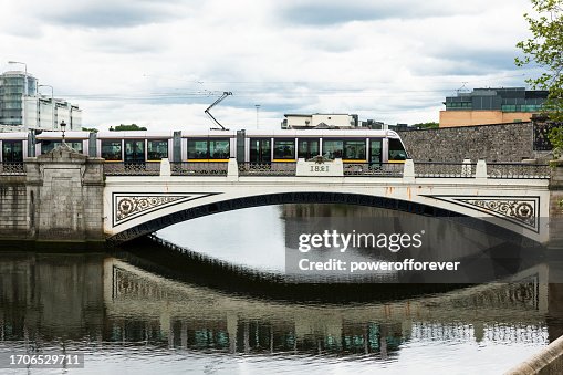Metro Train Crossing Sean Heuston Bridge In Dublin Ireland High Res metro-train-crossing-sean-heuston-bridge-in-dublin-ireland-high-res