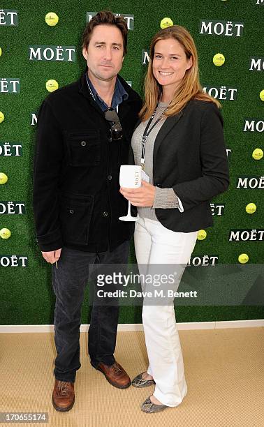 Luke Wilson and Meg Simpson attend The Moet & Chandon Suite at The Aegon Championships Queens Club finals on June 16, 2013 in London, England.