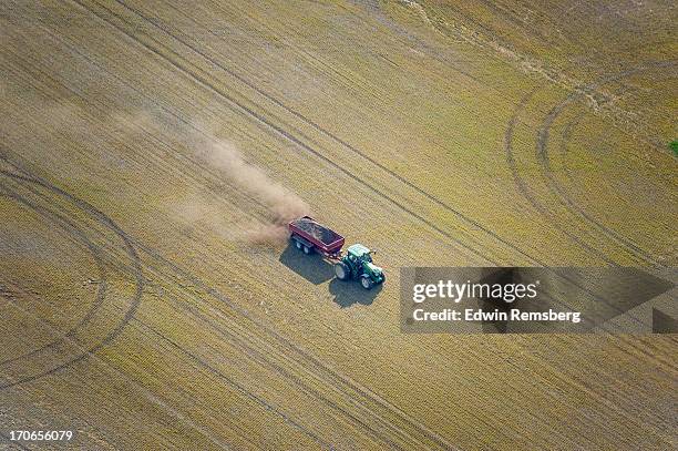 applying fertilizer - fertilizer stock pictures, royalty-free photos & images