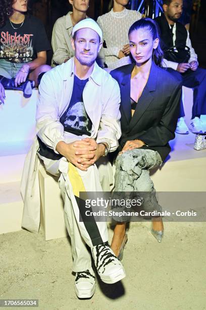 Joel Kinnaman and Kelly Gale attend the Isabel Marant Womenswear Spring/Summer 2024 show as part of Paris Fashion Week on September 28, 2023 in...