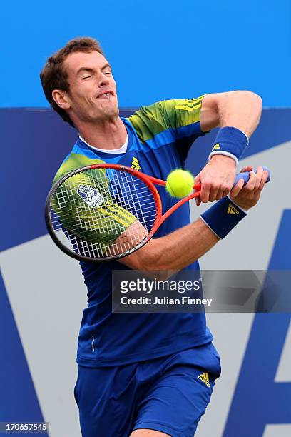 Andy Murray of Great Britain hits a backhand shot during the Men's Singles final against Marin Cilic of Croatia on day seven of the AEGON...