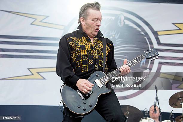 Garry Roberts from the Boomtown Rats performs on the Main Stage during day 4 of the Isle of Wight Festival at Seaclose Park on June 16, 2013 in...