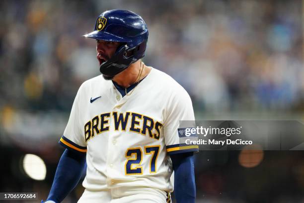 Willy Adames of the Milwaukee Brewers reacts after hitting a one-run single in the first inning during Game 2 of the Wild Card Series between the...