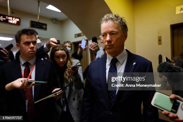 Sen. Rand Paul speaks to reporters as he walks through the Senate Subway at the U.S. Capitol Building on September 28, 2023 in Washington, DC. Sen....