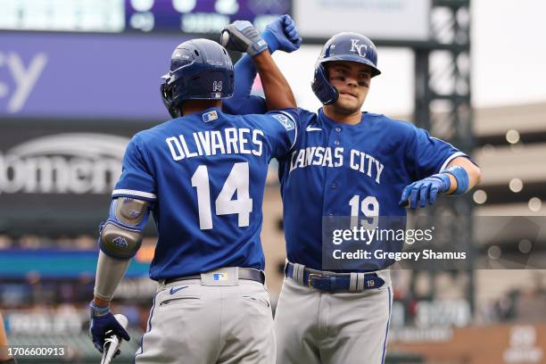 Michael Massey of the Kansas City Royals celebrates his third inning two run home run with Edward Olivares while playing the Detroit Tigers at...