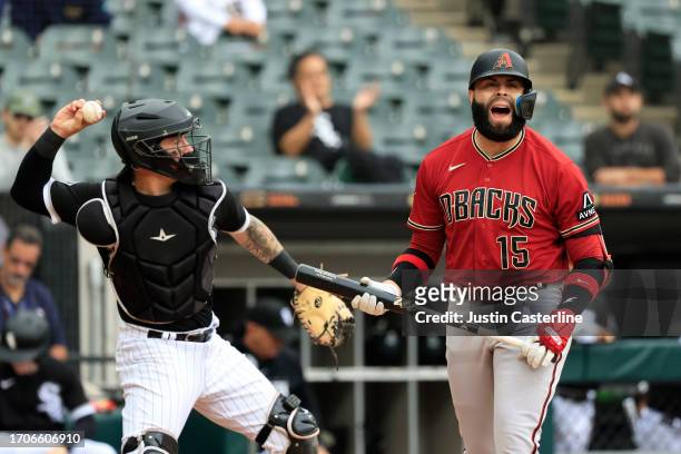 Emmanuel Rivera of the Arizona Diamondbacks reacts after striking back during the second inning in the game against the Chicago White Sox at...