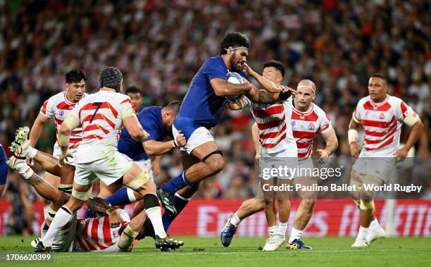 Steven Luatua of Samoa is tackled by Yutaka Nagare of Japan during the Rugby World Cup France 2023 match between Japan and Samoa at Stadium de...
