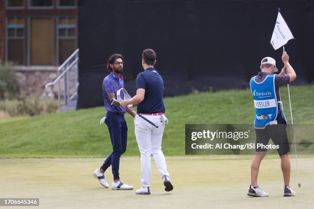 Akshay Bhatia of the United States and Beau Hossler of the United States shake hands on hole during the final round of the Barracuda Championship at...