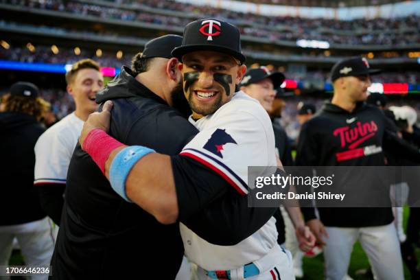Royce Lewis of the Minnesota Twins celebrates with teammates after the Twins defeated the Toronto Blue Jays in Game 2 of the Wild Card Series at...