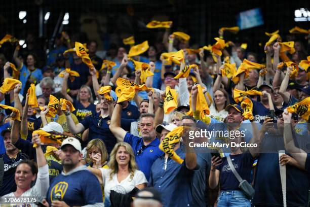 Fans wave rally towels in the stands prior to Game 2 of the Wild Card Series between the Arizona Diamondbacks and the Milwaukee Brewers at American...