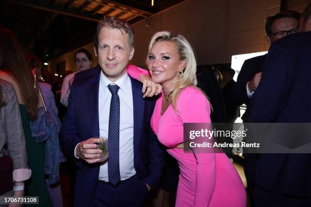Oliver Pocher and Evelyn Burdecki attend the German Television Award at MMC Studios on September 28, 2023 in Cologne, Germany.