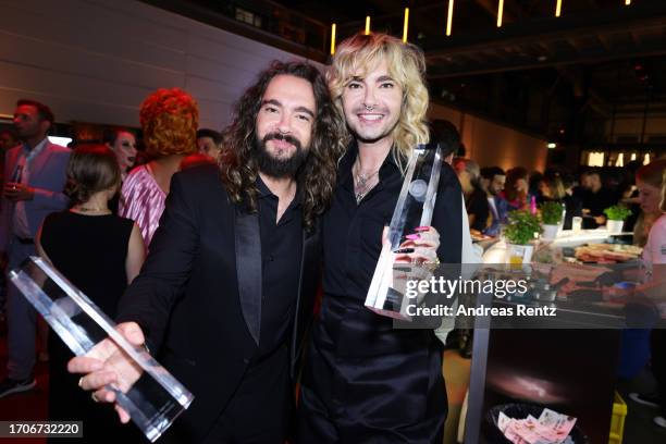 Tom Kaulitz and Bill Kaulitz attend the German Television Award at MMC Studios on September 28, 2023 in Cologne, Germany.