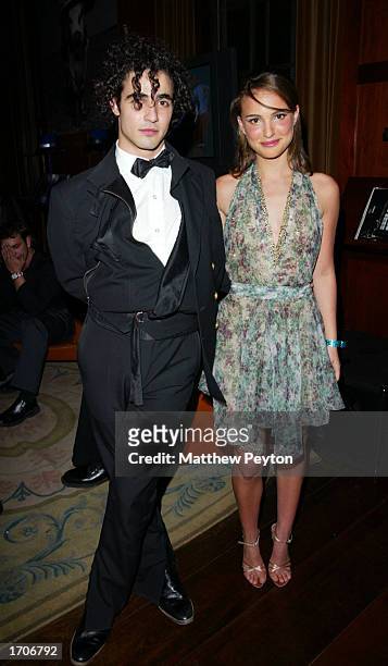 Designer Zac Posen and actress Natalie Portman pose at a New Year's Eve party hosted by Portman and singer Britney Spears at Ian Schrager's Hudson...