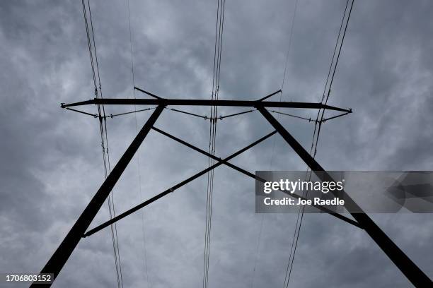 Electric power lines are attached to the Transmission tower along the power grid on September 28, 2023 in the Everglades, Florida. The Federal...