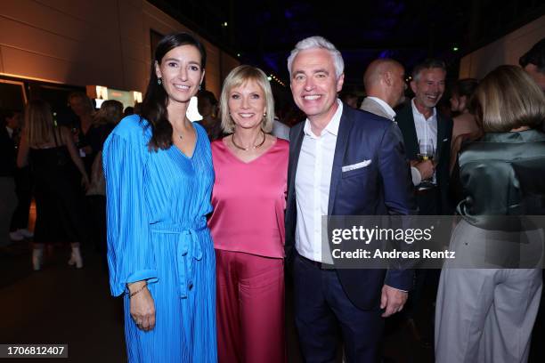 Pinar Atalay, Ilka Essmueller and Andreas von Thien attend the German Television Award at MMC Studios on September 28, 2023 in Cologne, Germany.