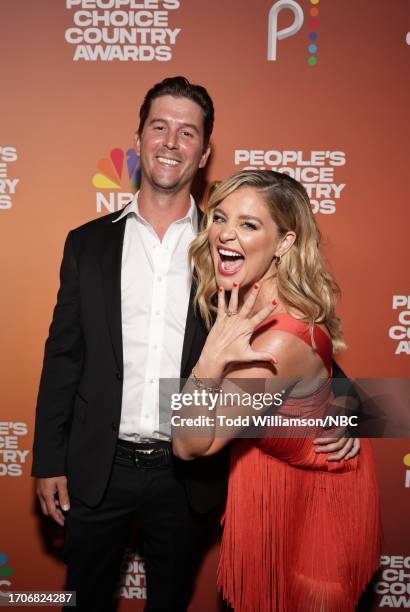 Pictured: Cam Arnold and Lauren Alaina arrive to the 2023 People's Choice Country Awards held at the Grand Ole Opry House on September 28, 2023 in...