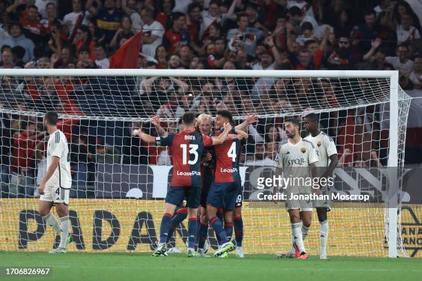 Morten Thorsby of Genoa CFC celebrates with team mates after scoring to give the side a 3-1 lead during the Serie A TIM match between Genoa CFC and...