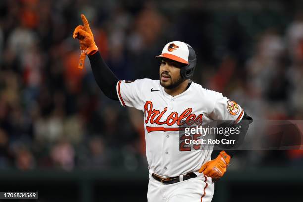 Anthony Santander of the Baltimore Orioles celebrates after hitting a solo home run against the Boston Red Sox in the first inning at Oriole Park at...