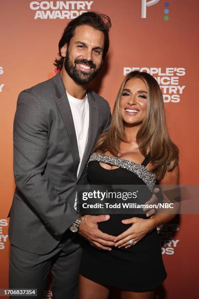 Pictured: Eric Decker and Jessie James Decker arrive to the 2023 People's Choice Country Awards held at the Grand Ole Opry House on September 28,...