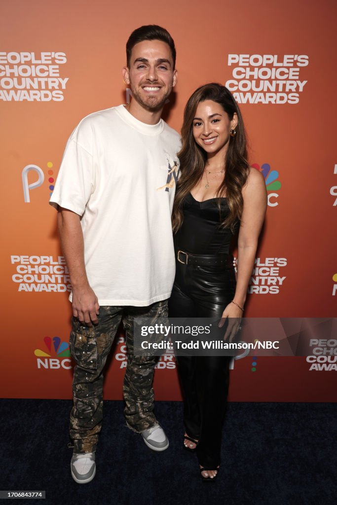 Roger And Talia Scott Roger Scott and Talia Scott arrive to the 2023 People's Choice... News