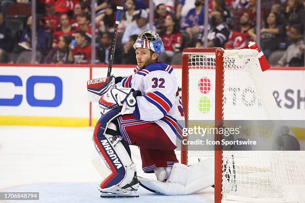 New York Rangers goaltender Jonathan Quick looks on during a... News