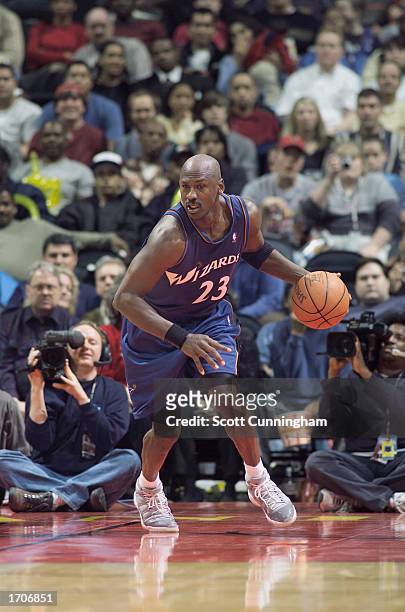 Michael Jordan of the Washington Wizards drives the ball during the NBA game against the Atlanta Hawks at Philips Arena on December 17, 2002 in...