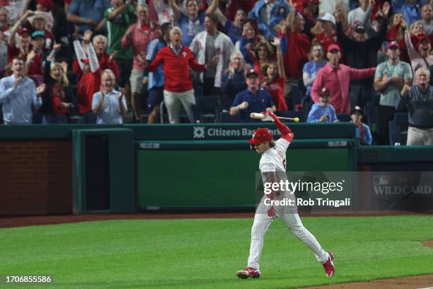 Bryson Stott of the Philadelphia Phillies hits a grand slam during the sixth inning of Game 2 of the Wild Card Series between the Miami Marlins and...