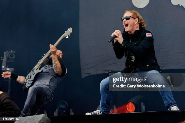 Jason Christopher Rappise and Corey Taylor of Stone Sour perform on stage on Day 3 of Download Festival 2013 at Donnington Park on June 16, 2013 in...