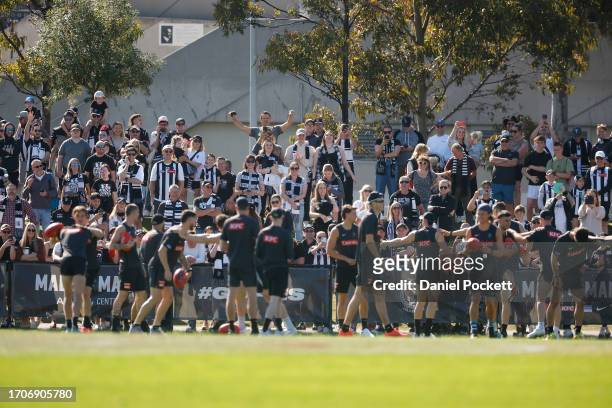 Magpies fans show their support during a Collingwood Magpies AFL training session at AIA Centre on September 29, 2023 in Melbourne, Australia.
