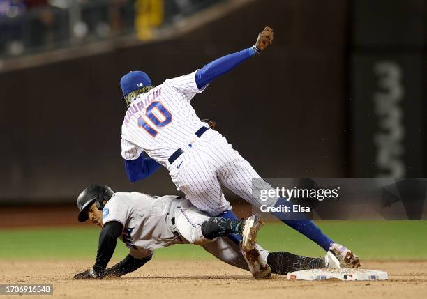 Xavier Edwards of the Miami Marlins is out as Ronny Mauricio of the New York Mets makes the tag to end the fifth inning at Citi Field on September...