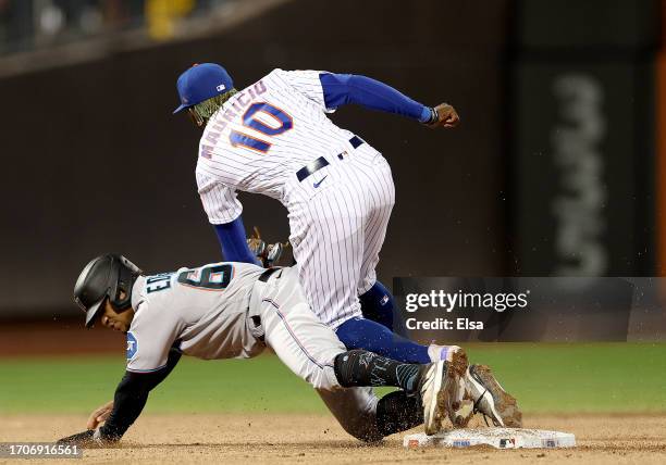 Xavier Edwards of the Miami Marlins is out as Ronny Mauricio of the New York Mets makes the tag to end the fifth inning at Citi Field on September...