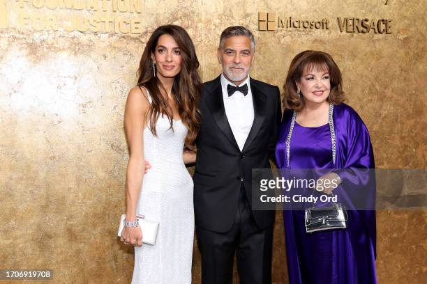 Amal Clooney, George Clooney and Baria Alamuddin attend the Clooney Foundation For Justice's "The Albies" on September 28, 2023 in New York City.