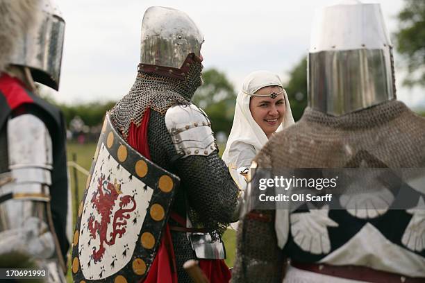 Reenactors in period costume prepare to stage a medieval battle at Eltham Palace on June 16, 2013 in Eltham, England. The 'Grand Medieval Joust'...