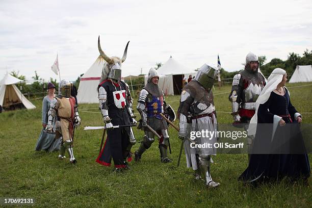 Reenactors in period costume prepare to stage a medieval battle at Eltham Palace on June 16, 2013 in Eltham, England. The 'Grand Medieval Joust'...