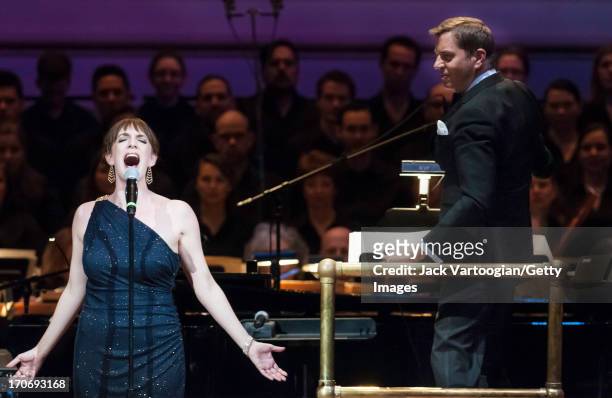 Actress and singer Julia Murney performs with the New York Pops orchestra, conducted by Steven Reineke, and the Essential Voices USA chorus at 'The...