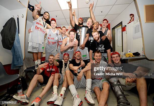 The players of the Brose Baskets Bamberg celebrate their victory after winning the finals of the Beko BBL playoffs between Brose Baskets and EWE...